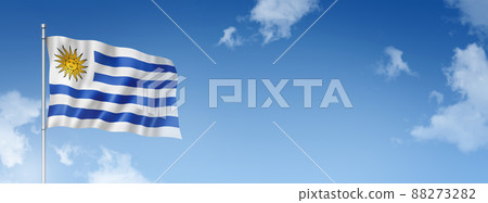 Uruguaian flag isolated on a blue sky. Horizontal banner 88273282