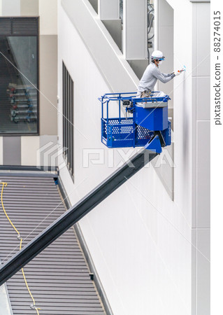 Construction site, aerial work platform, sealing work, caulking Construction site, aerial work platform, sealing work, caulking 88274015