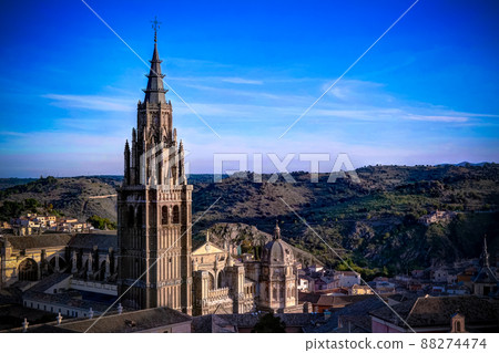 Panoramic aerial view to Toledo cathedral from the belltower of Jesuit San Ildefonso Church, Toledo, Spain Panoramic aerial view to Toledo cathedral from the belltower of Jesuit San Ildefonso Church, Toledo, Spain 88274474