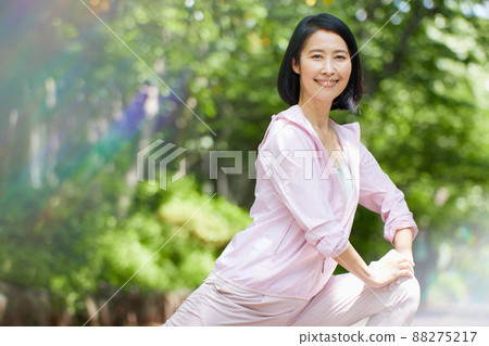 Middle women walking in sportswear Middle women walking in sportswear 88275217