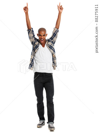 Weekend hero. Studio shot of a young man cheering. 88275911