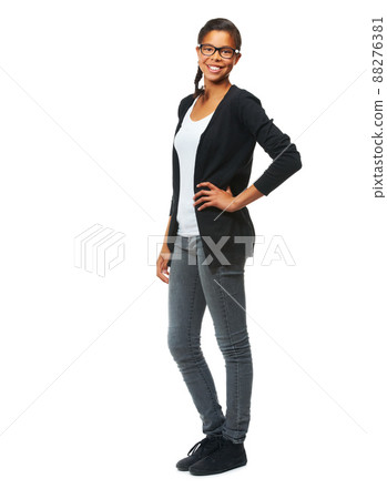 At the top of her class. Studio shot of an smiling teen posing against a white background. 88276381