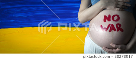 The War in Ukraine, Ukrainian conflict background. Inscription No war on the belly of a pregnant woman. Peace, pacifism, activism, no war and support concept The War in Ukraine, Ukrainian conflict background. Inscription No war on the belly of a pregnant woman. Peace, pacifism, activism, no war and support concept 88278017