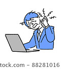 A businessman who makes a phone call to handle complaints while looking at a computer 88281016