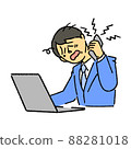 A businessman who makes a phone call to handle complaints while looking at a computer 88281018
