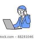 A businessman calling while watching a computer 88281046