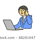 A businessman calling while watching a computer 88281047