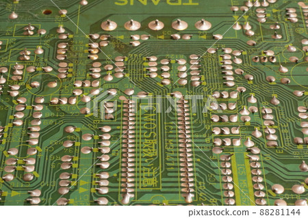 The back side of the printed circuit board where the soldering that fixes the electronic parts is lined up The back side of the printed circuit board where the soldering that fixes the electronic parts is lined up 88281144