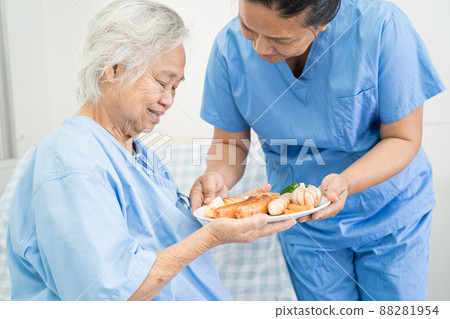 Asian senior or elderly old lady woman patient - Stock Photo