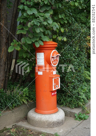 Round post in the forest 88282541