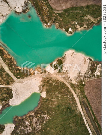 Aerial drone view Amazing industrial landscape, on Emerald lake in a flooded quarry 88282581