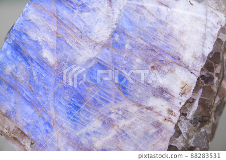 Mineral Oligoclase. or Belomorit. Background, texture. Selective focus. Beautiful abstract blue pattern. Soft focus Mineral Oligoclase. or Belomorit. Background, texture. Selective focus. Beautiful abstract blue pattern. Soft focus 88283531