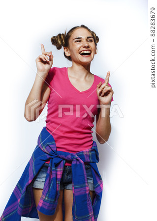 young pretty teenage hipster girl posing emotional happy smiling on white background, lifestyle people concept young pretty teenage hipster girl posing emotional happy smiling on white background, lifestyle people concept 88283679