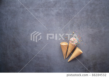top view of cone ice cream on a black background  88284532