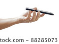 hand holding black smartphone isolated 88285073