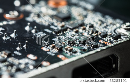 Abstract high-tech background with a printed circuit board, micro electronics 88285191
