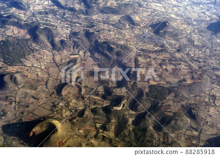 Mexico guadalajara fields and volcanos aerial view panorama landscape from airplane while flying from mexico city Mexico guadalajara fields and volcanos aerial view panorama landscape from airplane while flying from mexico city 88285918