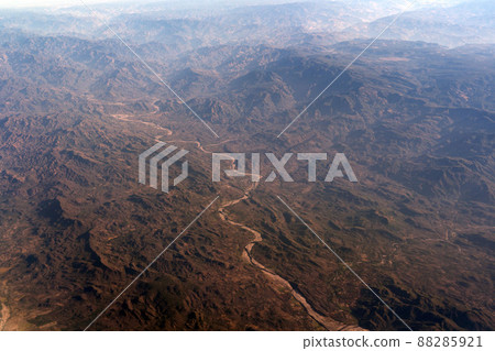 Mexico guadalajara fields and volcanos aerial view panorama landscape from airplane while flying from mexico city 88285921