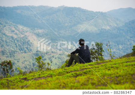 solo backpacker man happy and joyful after success climb the mountain solo backpacker man happy and joyful after success climb the mountain 88286347