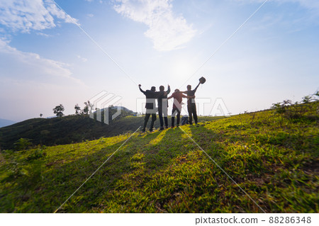 group of backpacker man happy and joyful after success climb the mountain 88286348