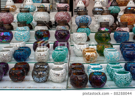 Turkish candlesticks lamps on street vendor counter. 88288044