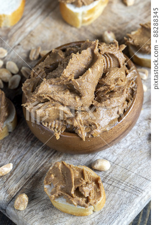 nut food on a cutting wooden board in the kitchen nut food on a cutting wooden board in the kitchen 88288345