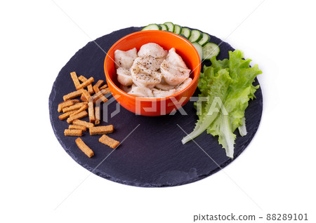 Pelmeni with herbs and breadcrumbs on a slate blackboard 88289101