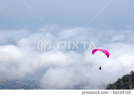 Enjoy the freedom with a paragliding flight Enjoy the freedom with a paragliding flight 88289180