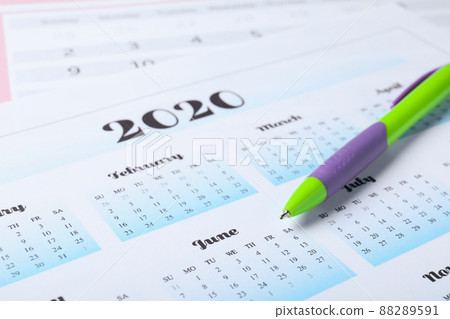 Pen on calendar page, closeup. Planning concept 88289591