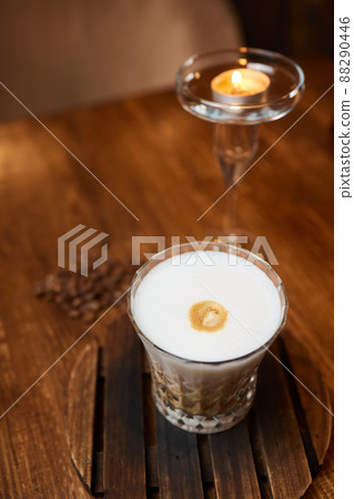 Cup of coffee on wooden table, top view. Cup of coffee on wooden table, top view. 88290446