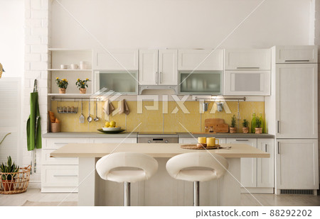 Modern kitchen interior with stylish white furniture Modern kitchen interior with stylish white furniture 88292202