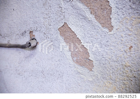 White paint sprayed wall peeling cracks White paint sprayed wall peeling cracks 88292525