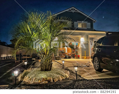 American garage house with palm trees 88294191