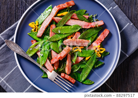 fried sugar snap peas with tuna slices fried sugar snap peas with tuna slices 88297517