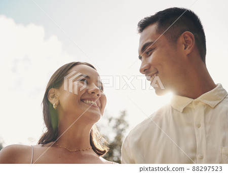 My favourite days are the days with you. Shot of a happy young couple standing outside together during the day. My favourite days are the days with you. Shot of a happy young couple standing outside together during the day. 88297523