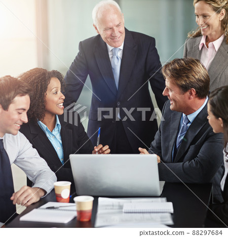 Sounds good to me. Cropped shot of a group of businesspeople in a meeting. 88297684