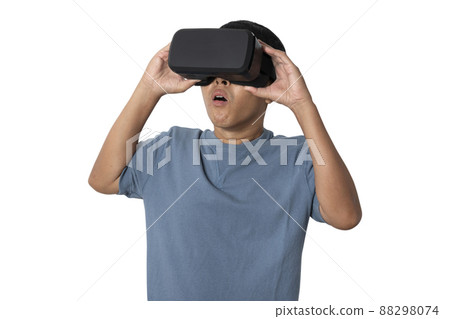 Studio portrait man wearing VR Headset isolated on white background. Studio portrait man wearing VR Headset isolated on white background. 88298074