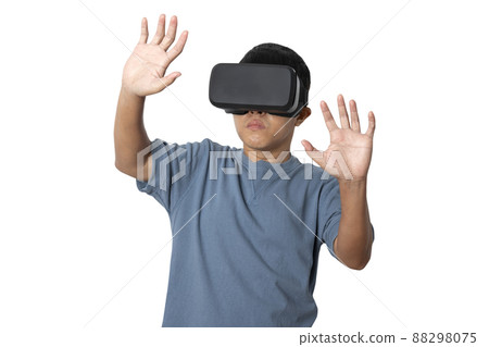 Studio portrait man wearing VR Headset isolated on white background. Studio portrait man wearing VR Headset isolated on white background. 88298075
