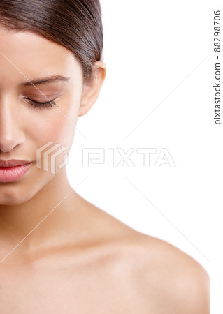 Her skin is so pure. Cropped studio shot of a beautiful young woman with her eyes closed. 88298706