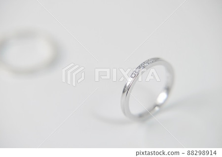 Diamond engagement ring with a simple design on a plain white background Diamond engagement ring with a simple design on a plain white background 88298914