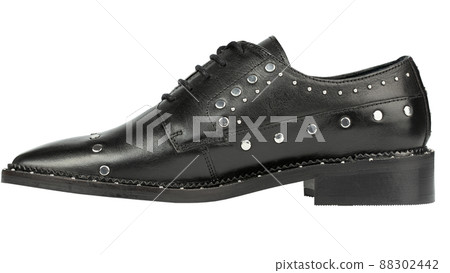 Women's leather boots close-up black color. Oxford style shoes. Women's leather boots close-up black color. Oxford style shoes. 88302442