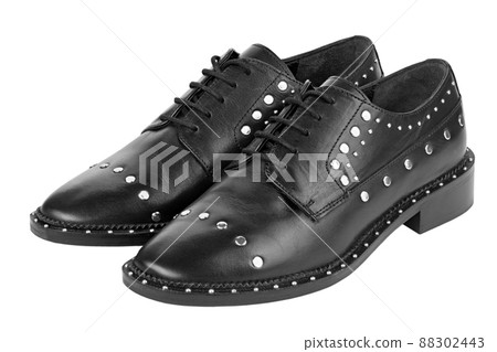 Women's leather boots close-up black color. Oxford style shoes. Casual shoes. Women's leather boots close-up black color. Oxford style shoes. Casual shoes. 88302443