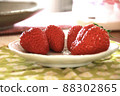 Strawberries lined up on the table 88302865