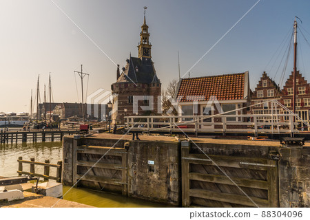 Hoorn, Netherlands, March 2022. The historic defense tower at the harbor entrance of Hoorn. Hoorn, Netherlands, March 2022. The historic defense tower at the harbor entrance of Hoorn. 88304096