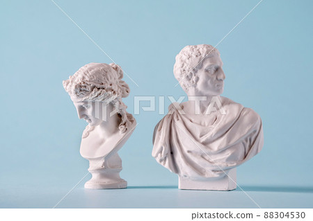 Two white Roman or antique style Grecian busts Two white Roman or antique style Grecian busts 88304530