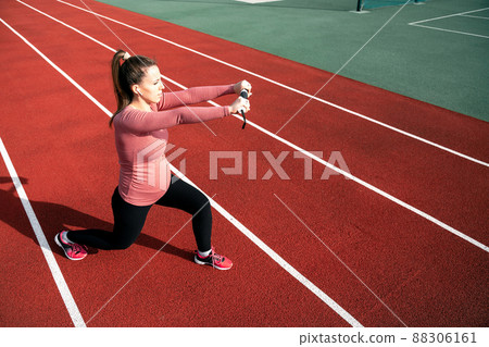 Pregnancy fitness. Prenatal healthy fitness active fit gym outside. Pregnant woman training yoga sport exercise. Prenatal Gymnastics. Pregnancy fitness. Prenatal healthy fitness active fit gym outside. Pregnant woman training yoga sport exercise. Prenatal Gymnastics. 88306161