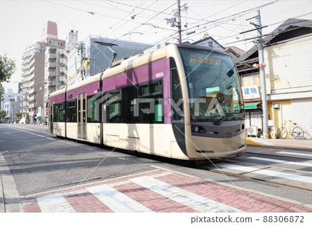 Hankai Tramway 1001 type articulated vehicle Sumiyoshitoriimae Sumiyoshi Ward Osaka City Osaka Prefecture 88306872