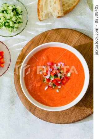 Traditional spanish cold tomato soup of fresh raw vegetables 88309405