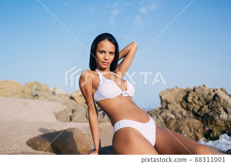 Attractive woman in bikini on white - stock photo 421475