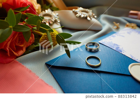 Wedding rings and wedding invitation. Shallow dof Wedding rings and wedding invitation. Shallow dof 88313842